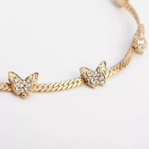 Annajays Boutique Jewelry - DAINTY RHINESTONE BUTTERFLY CHOKER IN GOLD Annajays Boutique Jewelry - DAINTY RHINESTONE BUTTERFLY CHOKER IN GOLD